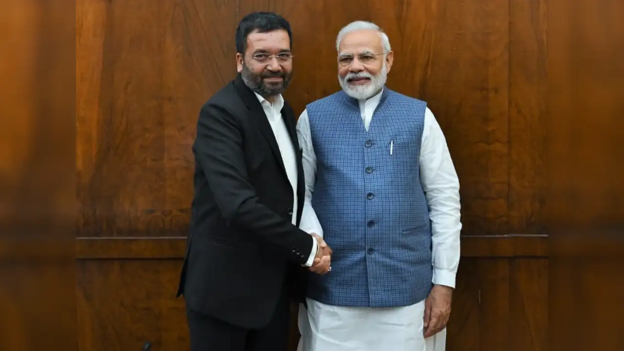Shri Mitesh Patel with Hon'ble Prime Minister